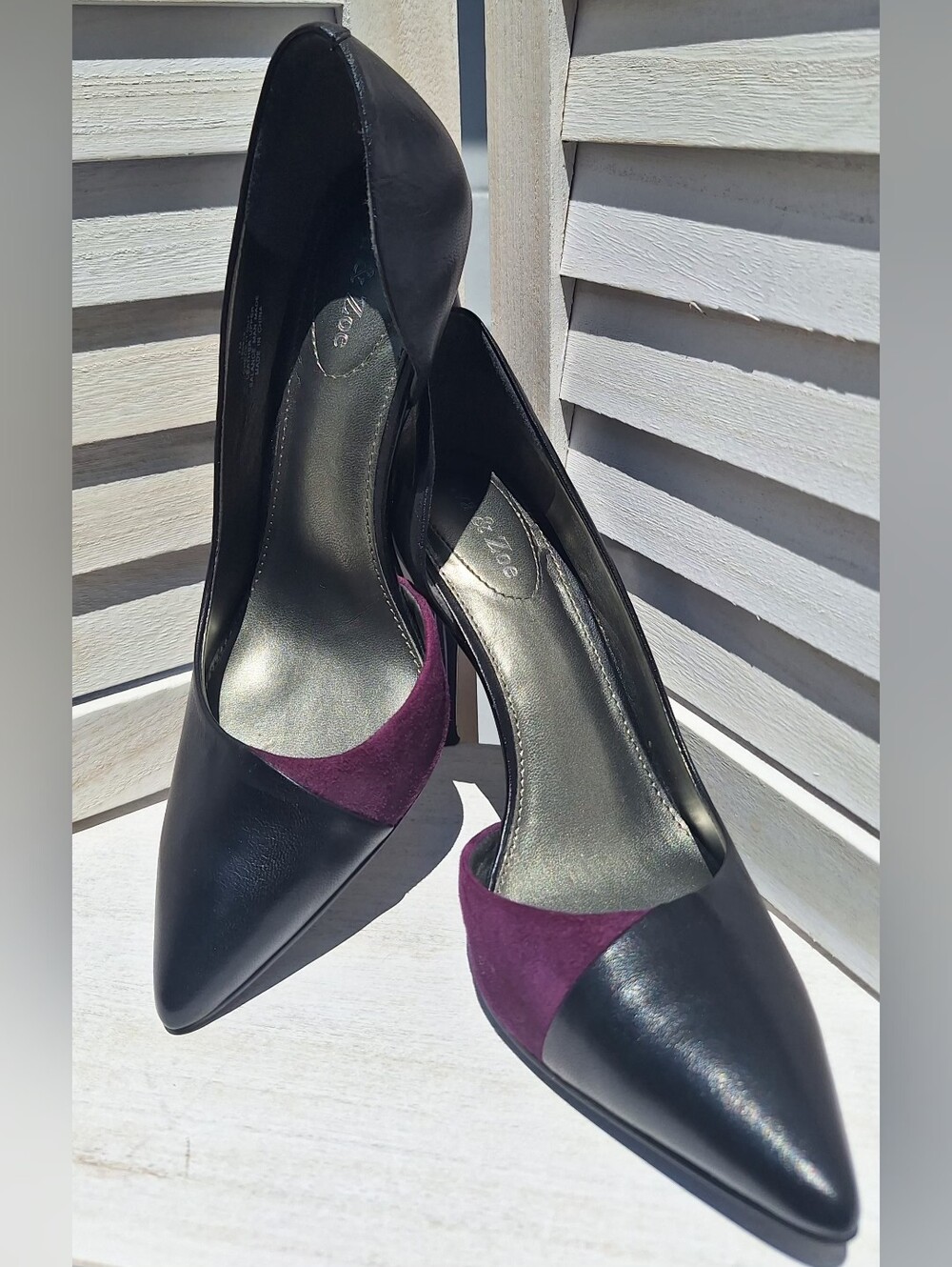 Black Leather Pointed-Toe Pumps with Plum Accent